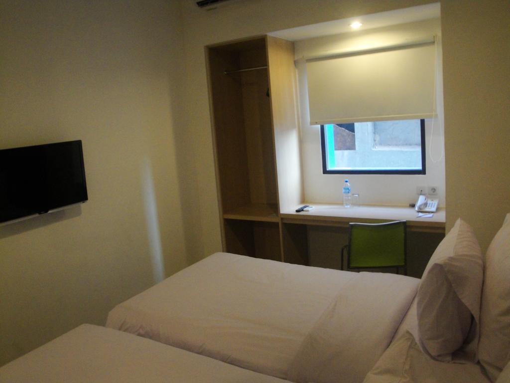 โรงแรมท็ฮป มินดาเนา บาย กรัน ปุรี มานาโด ห้อง รูปภาพ